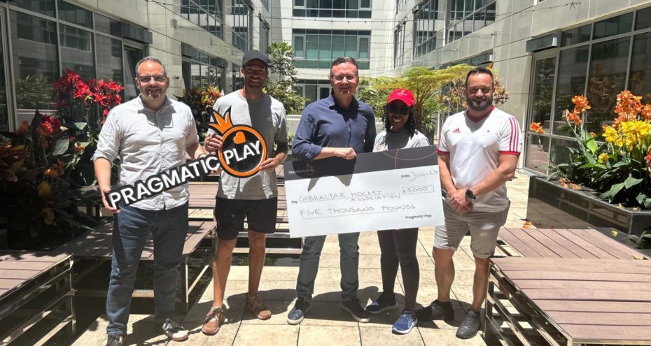 Julian Jarvis, CEO & Co-Founder of Pragmatic Play & Veridian (Gibraltar) Limited (centre), presenting donation to Gibraltar Hockey Authority.